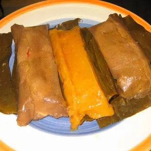 Puerto Rican Pasteles, Platano masa Pasteles with either pork or chicken and yuca Pasteles with either pork or chicken. We also do Vegan.