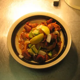 The Sexy Mofongo (seasoned mashed plantains) with fried pork,chicken and shrimps.