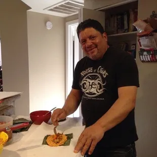 Making the famous and delicious Puerto Rican Pasteles , made with either green banana and Yautia masa or Cassava. Pork or chicken filled