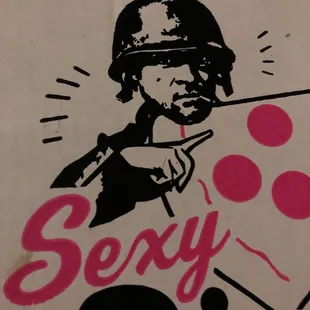 a man holding a pizza box