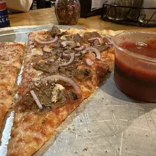Sausage and 'shrooms! I had them add onions. As always, a side of marinara for crust dipping.