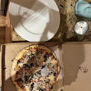 Super small pizza for $30. Also did not order olives or red onion