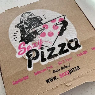 a pizza box with a pizza on it