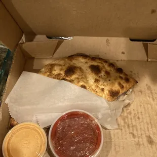 Calzone, spicy ranch and marinara sauce