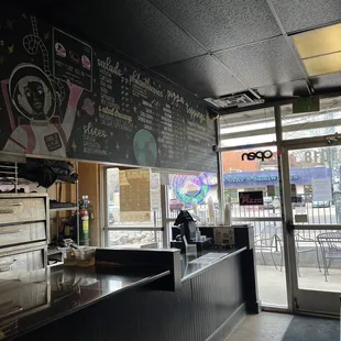 a woman standing at the counter