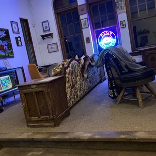 a man sitting on a chair in a living room