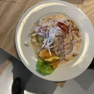 Ceviche 19 (only fish marinated in lemon juice salt and pepper with Peruvian chili peppers accompanied with cancha, sweet potato and corn