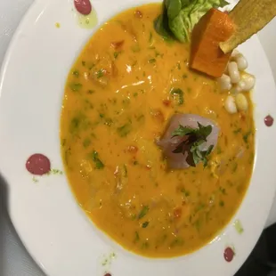 fish tiradito in Peruvian yellow chili