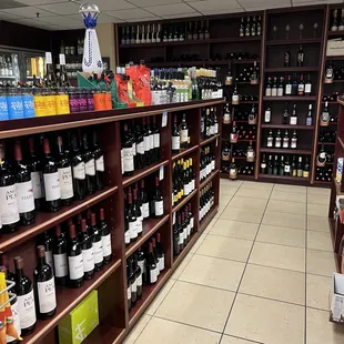 shelves of wine in a store
