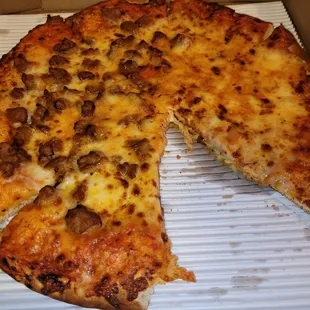 Hard crust pizza with no extra cheese.
