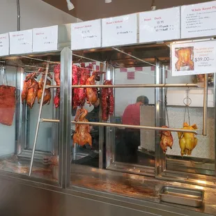 Chinese BBQ meats and pricing.