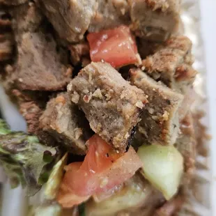 meat and vegetables in a styrofoam container