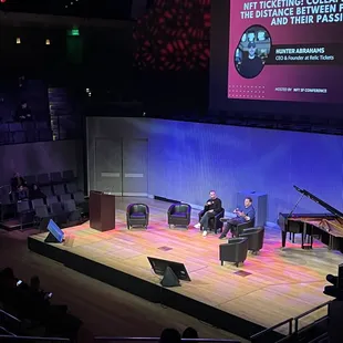 a stage with two people on it