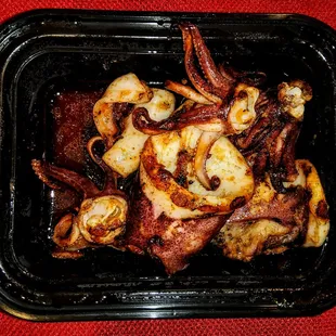 Grilled Spiced Calamari: Romesco, Red Peppers. $18