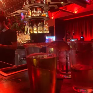 a bar with a television in the background