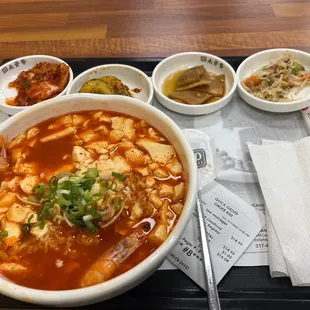 Seafood Dubu Ramen. 2 shrimps, 3 mini clams, and 1 oyster. $16. Not worth it Ramen was soft and over done. Lots of tofu,