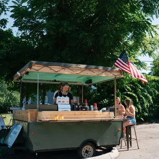Our converted pop-up camper coffee trailer here to serve up a unique experience and tasty drinks!