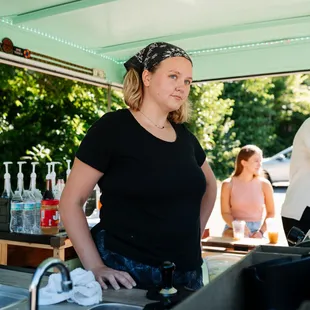 Our oldest daughter, Zoe! She brings an artistic, friendly flare to the shop. She will stop what she's doing to greet babies and dogs.