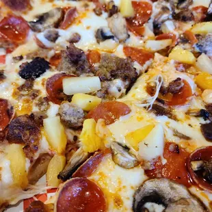 14" pepperoni mushroom sausage pineapple.