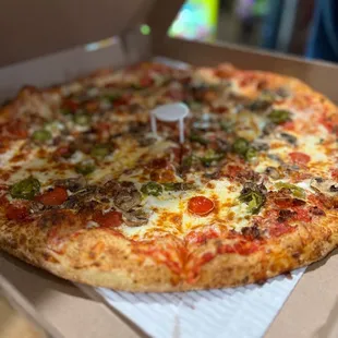 a pepperoni pizza in a box