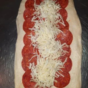 Every pepperoni roll is made to order and stuffed with cheese and pepperoni!