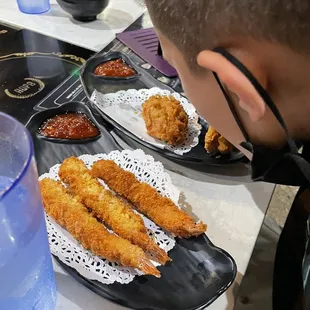 No kids menu. Fried shrimp and Korean Fried Chicken I ordered off the appetizer menu. $8.99 for each item.