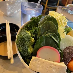 Side order of greens, noodles, and other pot items