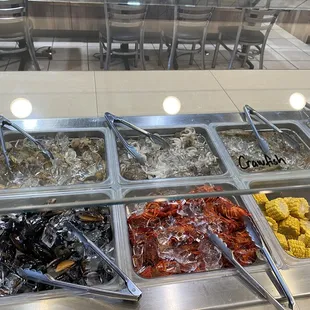 a variety of food items in a buffet