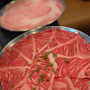 Look at the beautiful diagonal cuts in their Zabutan! The A5 Wagyu is in the back!