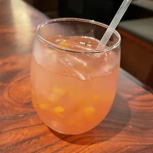 a drink in a glass with a straw
