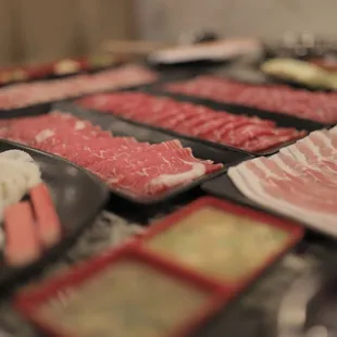 a variety of meats on a table