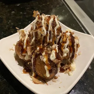 Takoyaki  it is so good!!!! I love it!!!