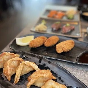 three plates of food on a table