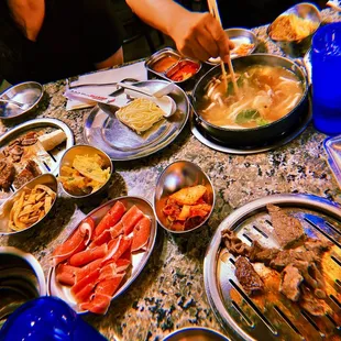 a table full of different foods