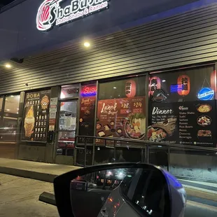 the exterior of a restaurant at night
