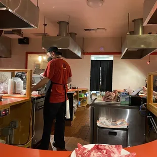 Someone shredding up the meat