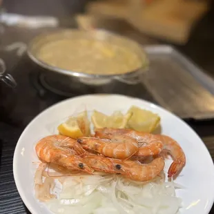 a plate of shrimp and rice