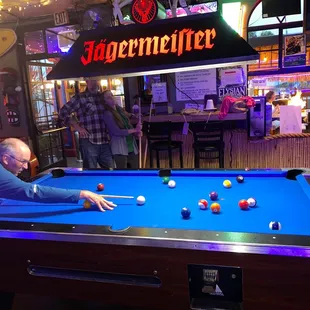 a man playing pool