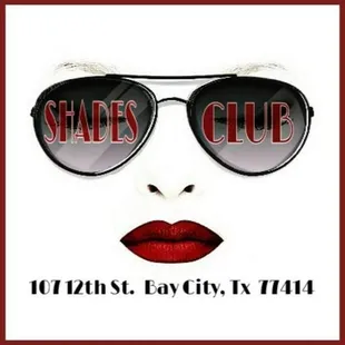 a woman with sunglasses and red lipstick