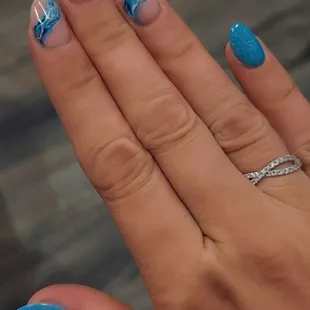 Dip mani with gel top coat and designs.