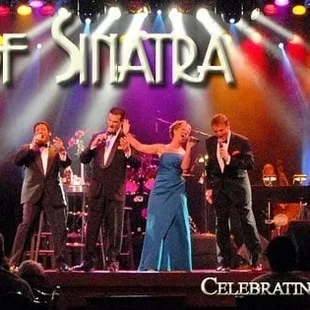 a group of people on stage