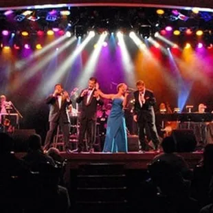 a band performing on stage