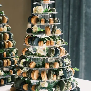 a tiered cake with macarons