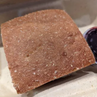 a shadobeni sandwich in a styrofoam container