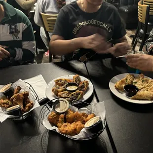 Chicken Wings , Fried Cauliflower, Southwest Eggrolls, Buffalo Chicken Eggrolls