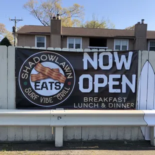 a sign on a fence