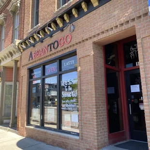 the entrance to a restaurant