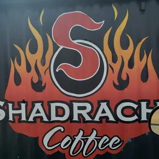 a sign for shadrach coffee