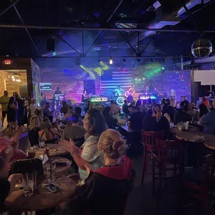Pianos, stage and crowd.