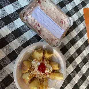 a plate of food and a bag of ice cream